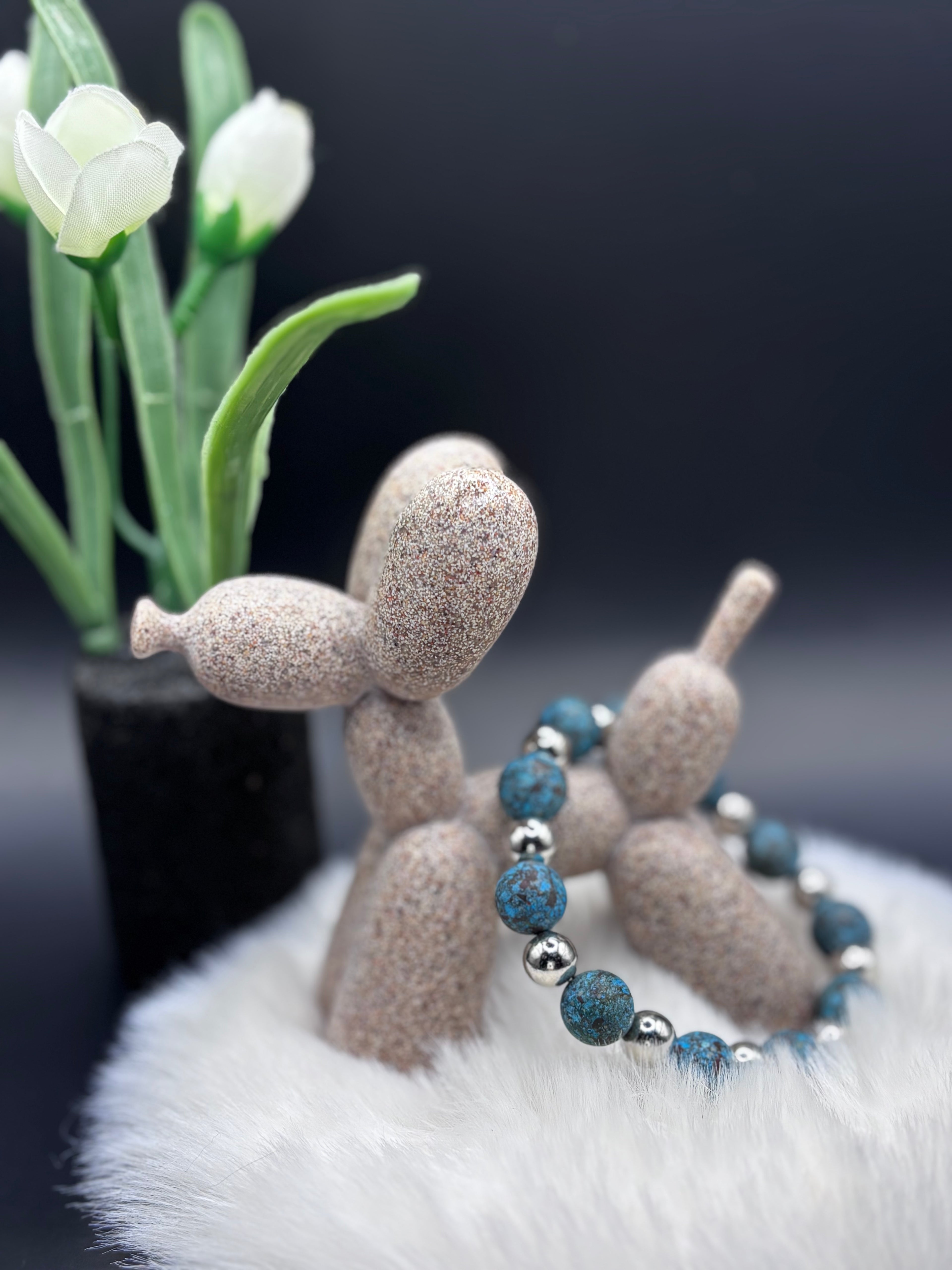 Turquoise fave’s - Afrikaans mat met zilverkleurige spacers